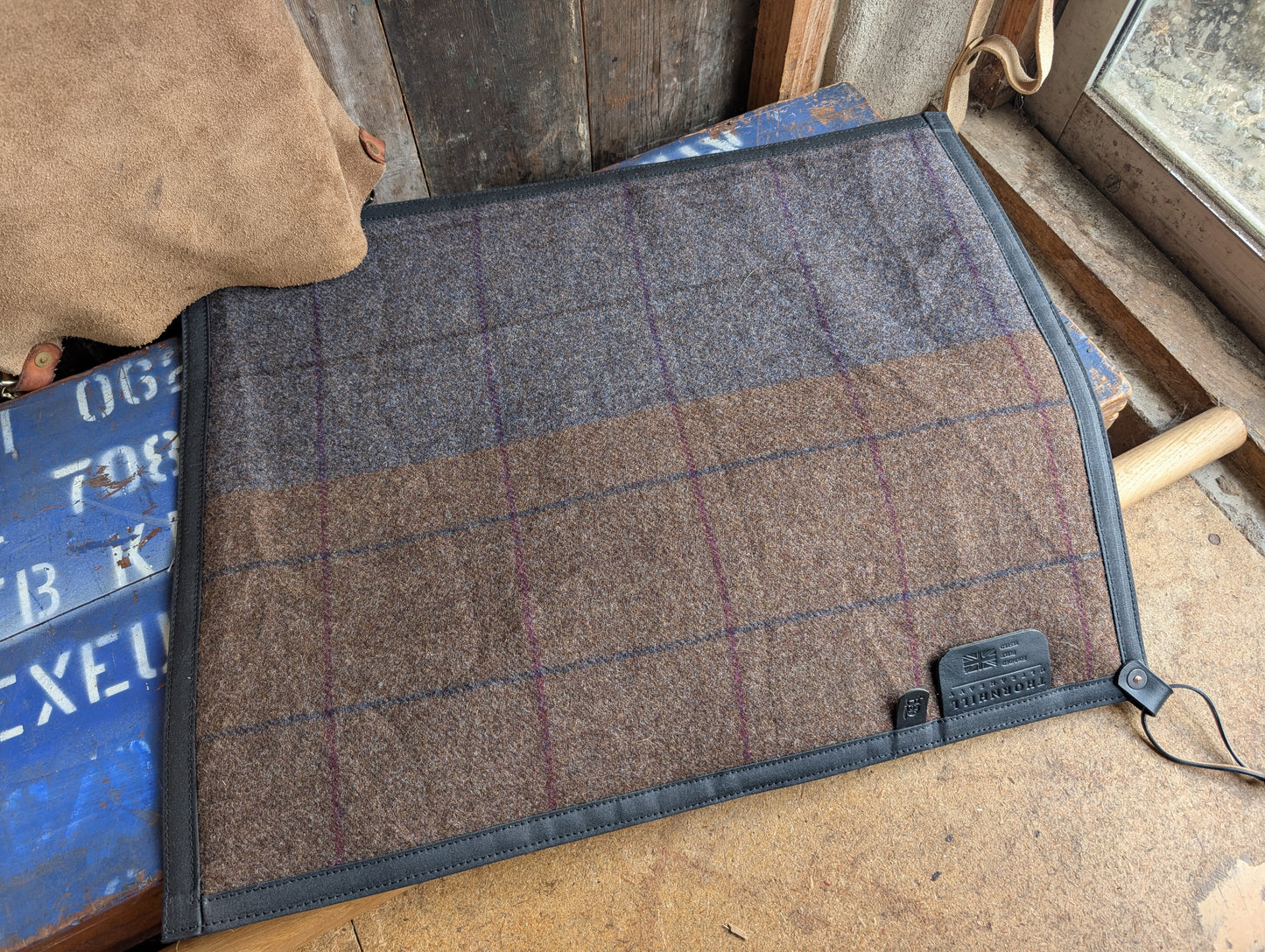 Padded sit-pad, checked wool & waxed canvas with leather tie-out