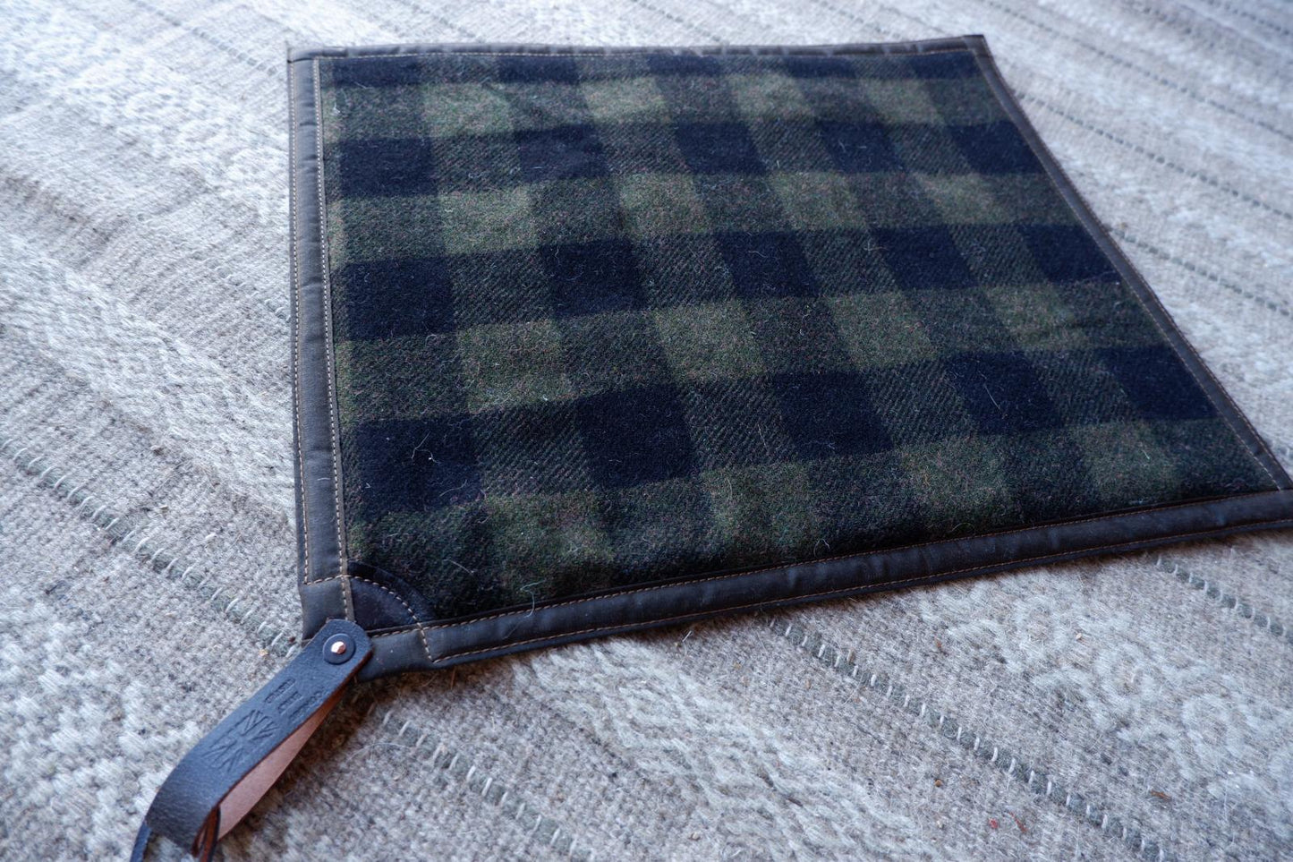 Padded sit-pad, checked wool & waxed canvas with leather tie-out