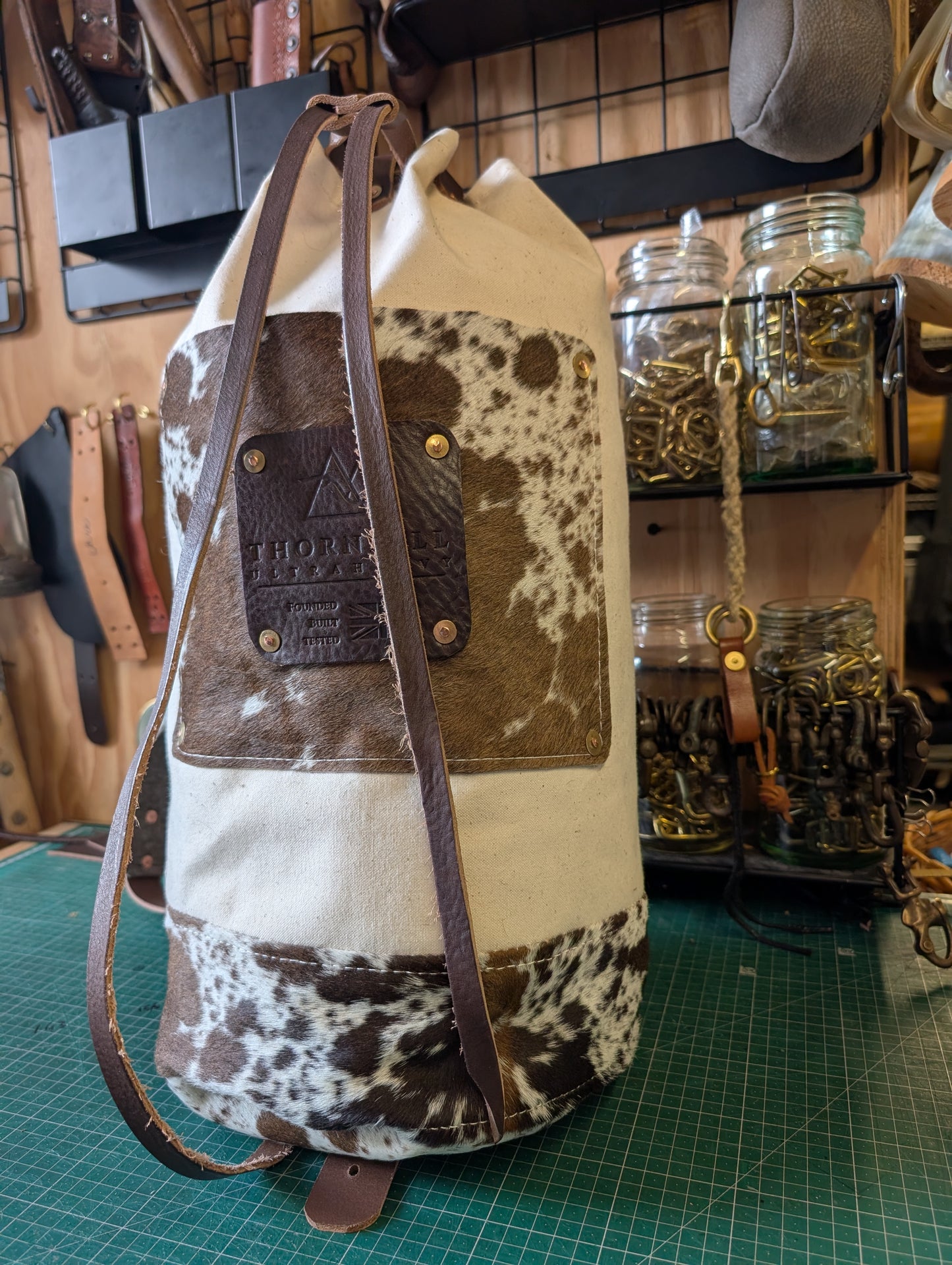 Furry cow sea sack style bag , leather and canvas &  lined waxed eco beeswax cotton