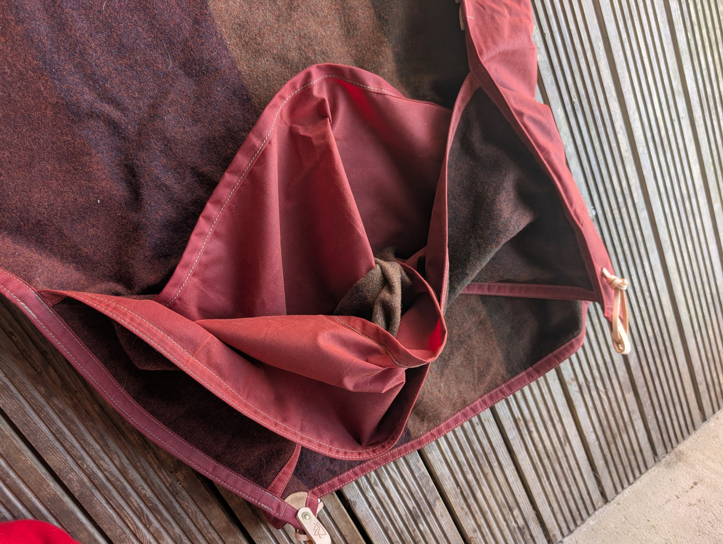 Sleeping mat/pad cover, waxed-canvas-backed wool with leather tie-outs