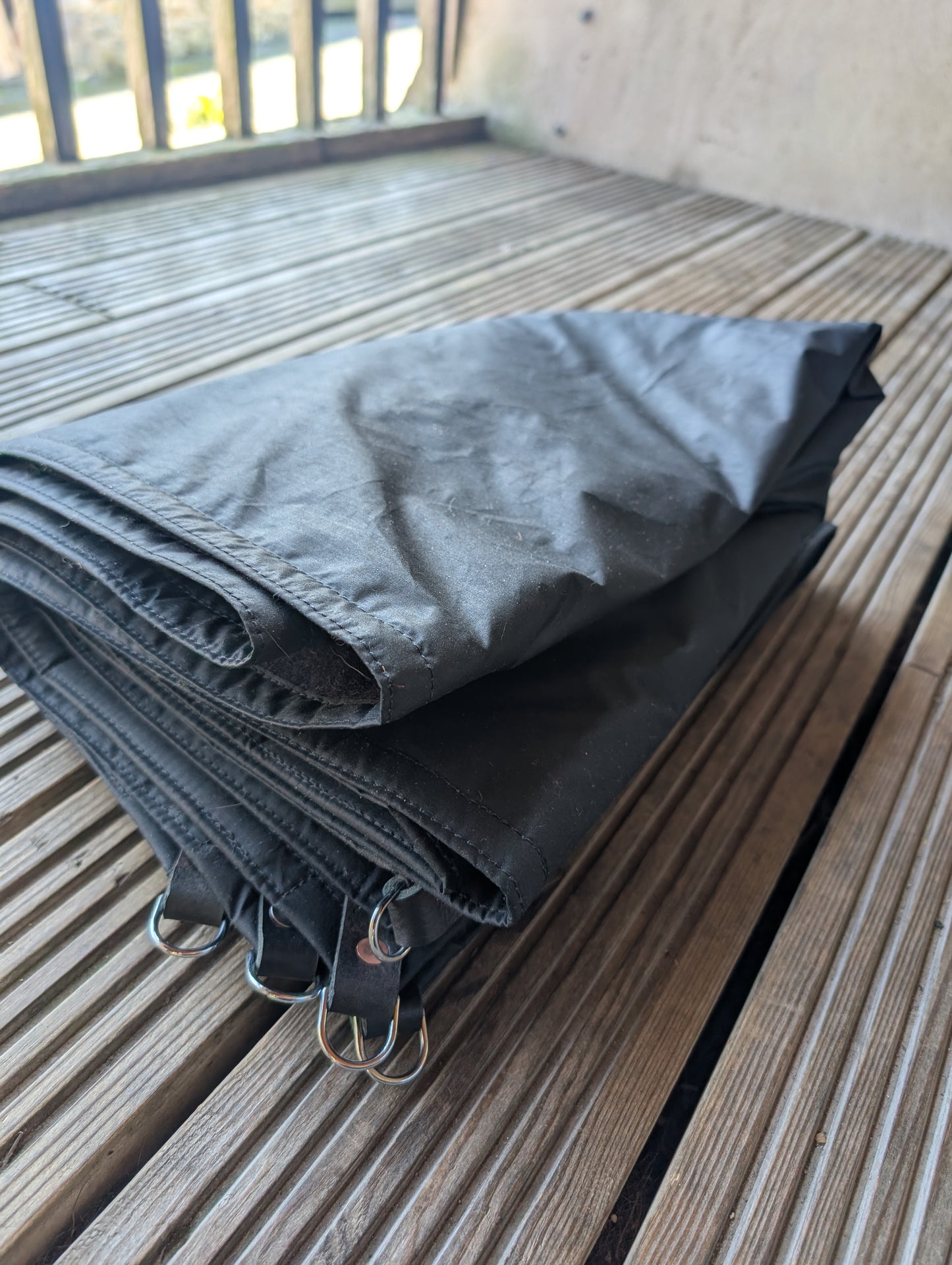 Sleeping mat cover, waxed-canvas-backed wool with leather tie-outs