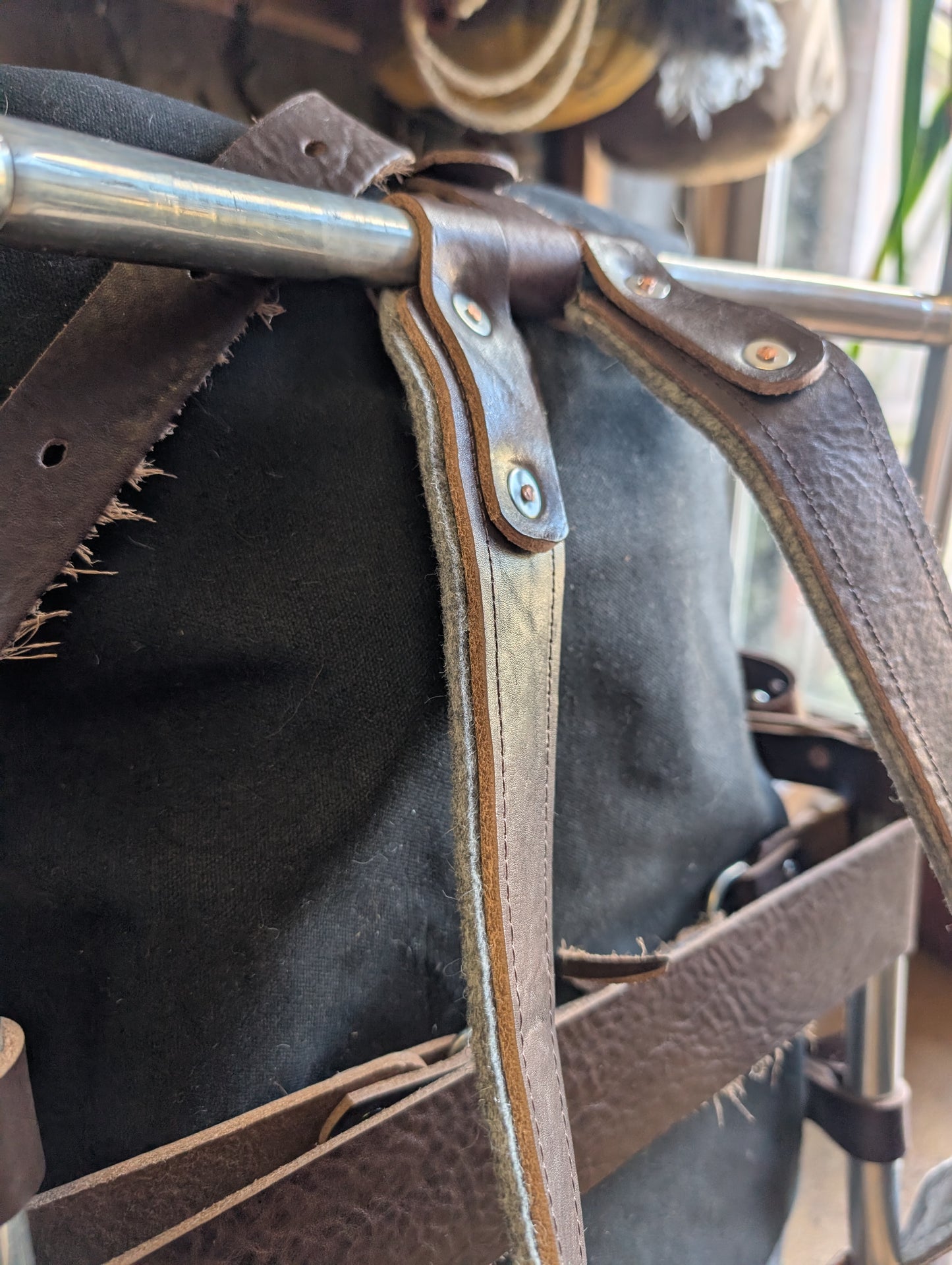 Pack basket/external frame rucksack/ gear hauler. Rebuild of vintage aluminium frame pack with leather , wool and rivets