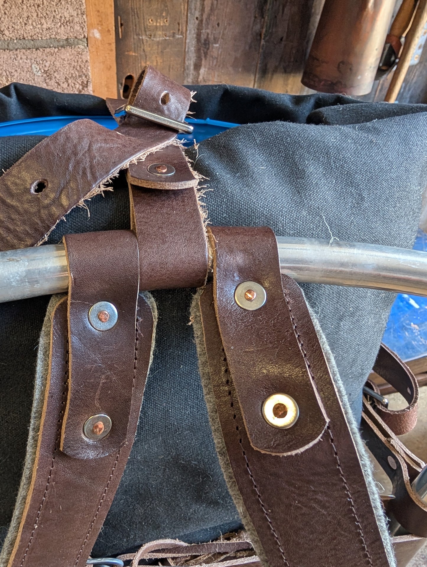 Pack basket/external frame rucksack/ gear hauler. Rebuild of vintage aluminium frame pack with leather , wool and rivets