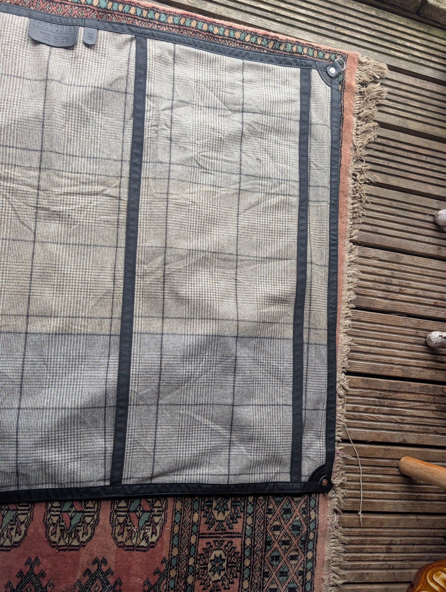 Sleeping mat/pad cover, waxed-canvas-backed checked wool with leather tie-outs