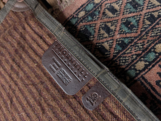 Sleeping mat/pad  beeswax-coton-backed wool with leather tie-outs