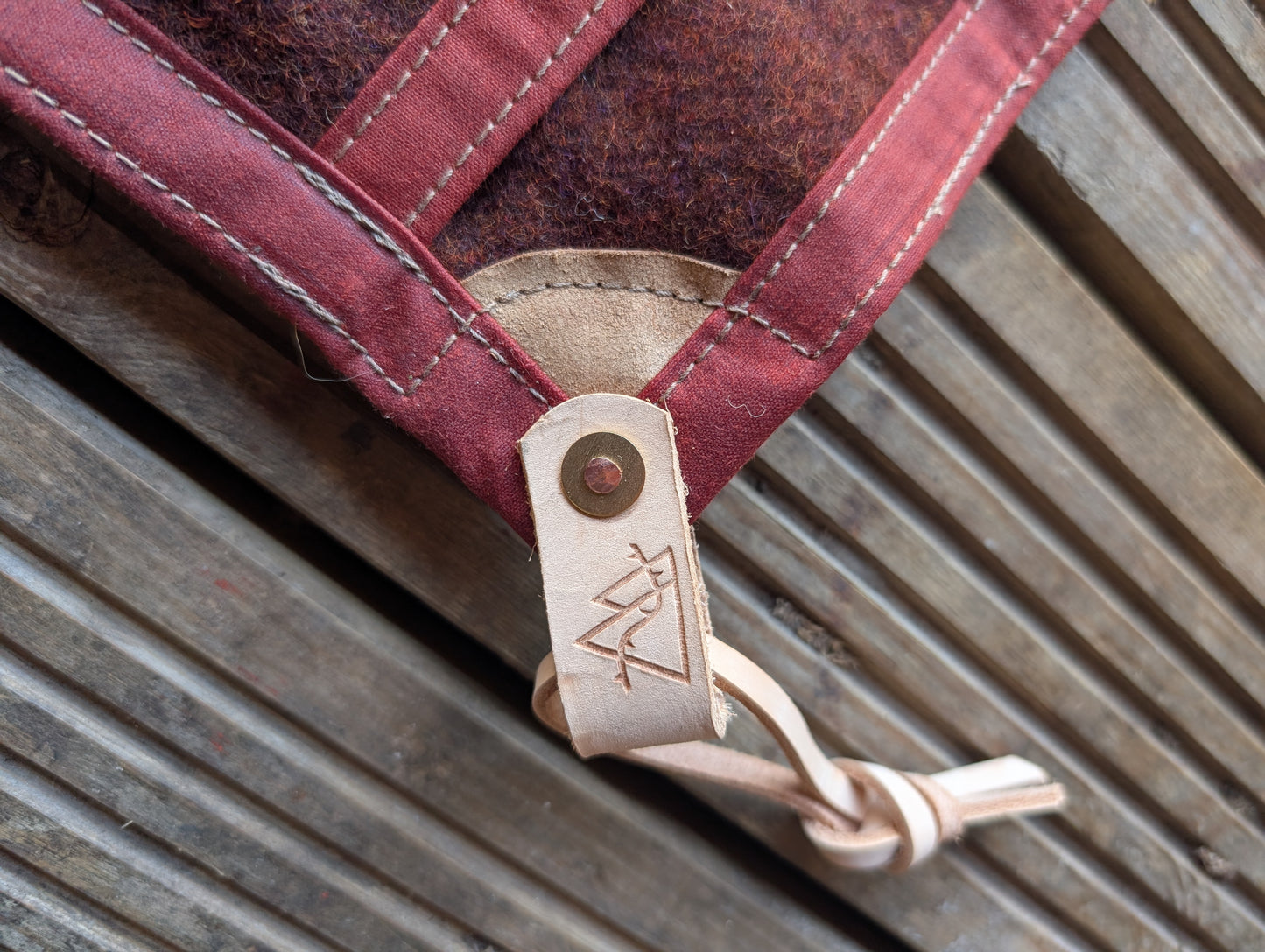 Sleeping mat/pad cover, waxed-canvas-backed wool with leather tie-outs
