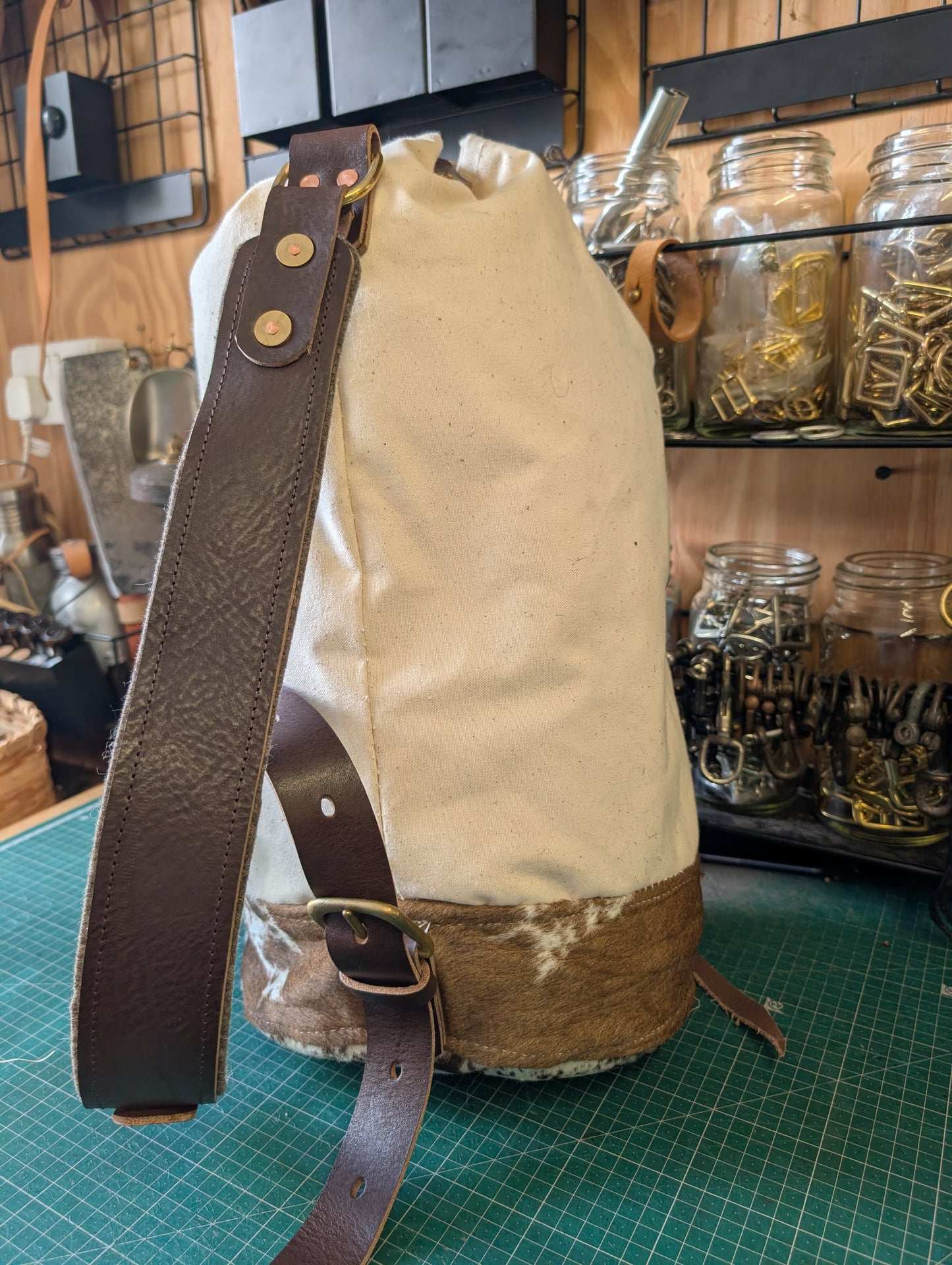 Furry cow sea sack style bag , leather and canvas &  lined waxed eco beeswax cotton