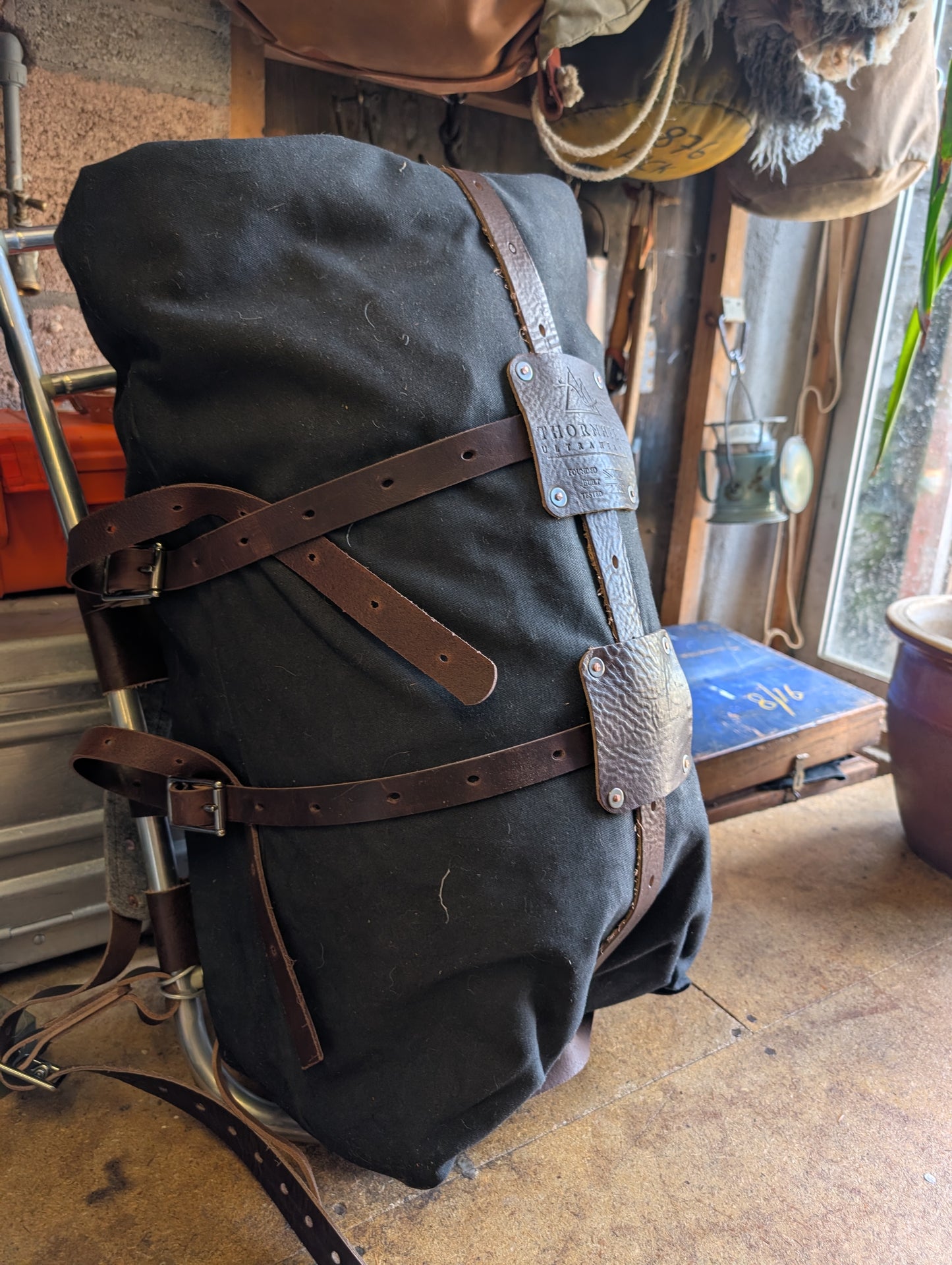 Pack basket/external frame rucksack/ gear hauler. Rebuild of vintage aluminium frame pack with leather , wool and rivets