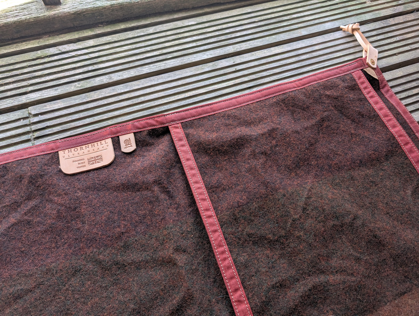Sleeping mat/pad cover, waxed-canvas-backed wool with leather tie-outs