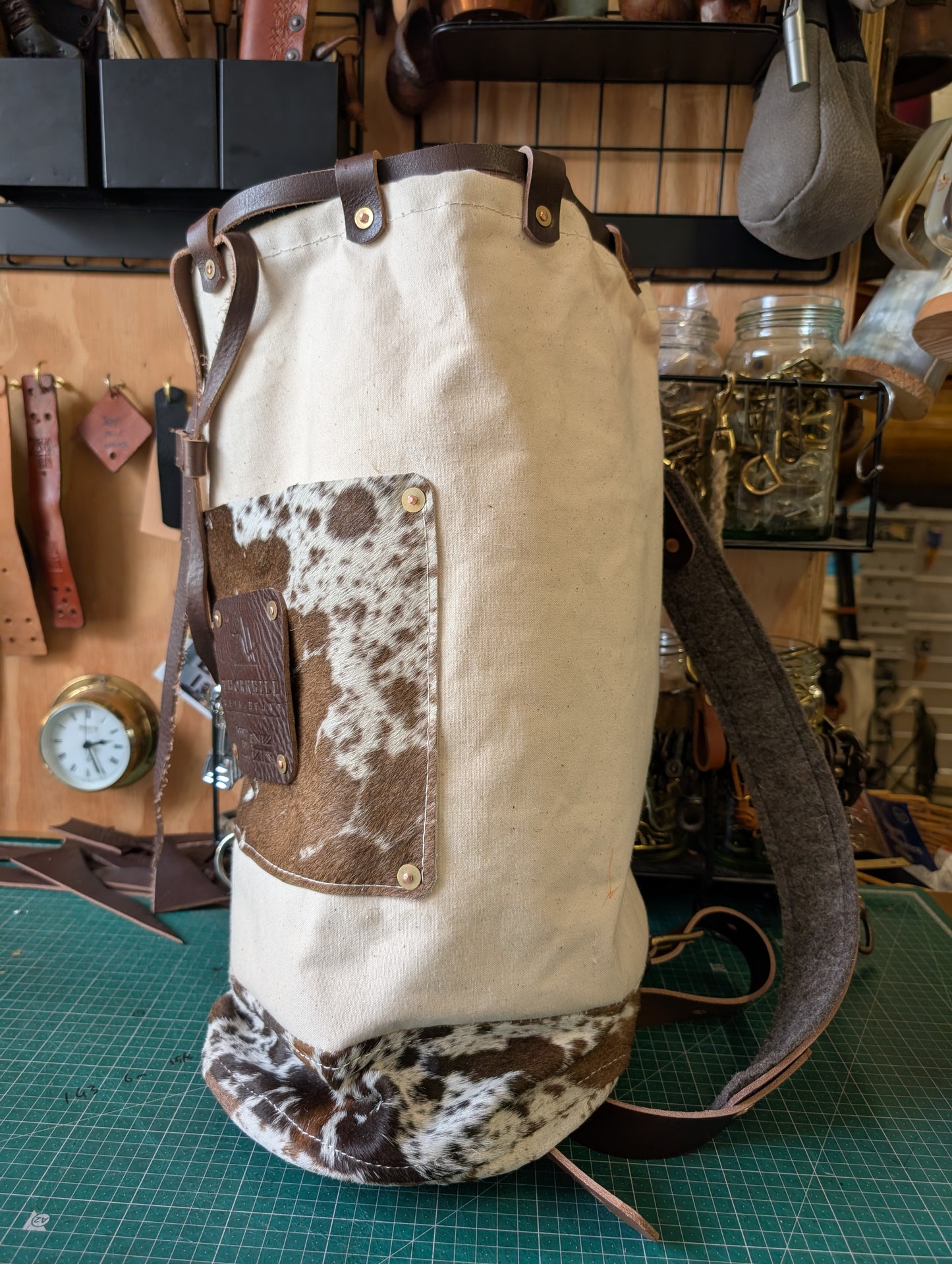 Furry cow sea sack style bag , leather and canvas &  lined waxed eco beeswax cotton