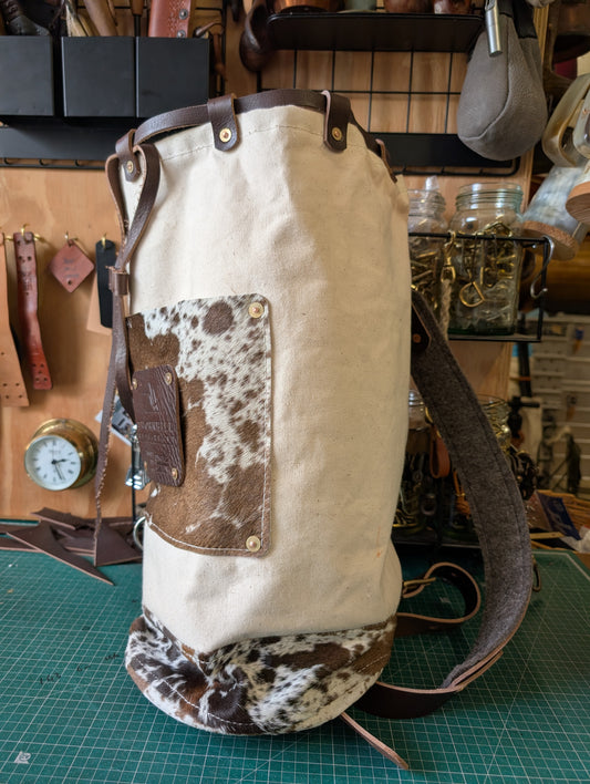 Furry cow sea sack style bag , leather and canvas &  lined waxed eco beeswax cotton