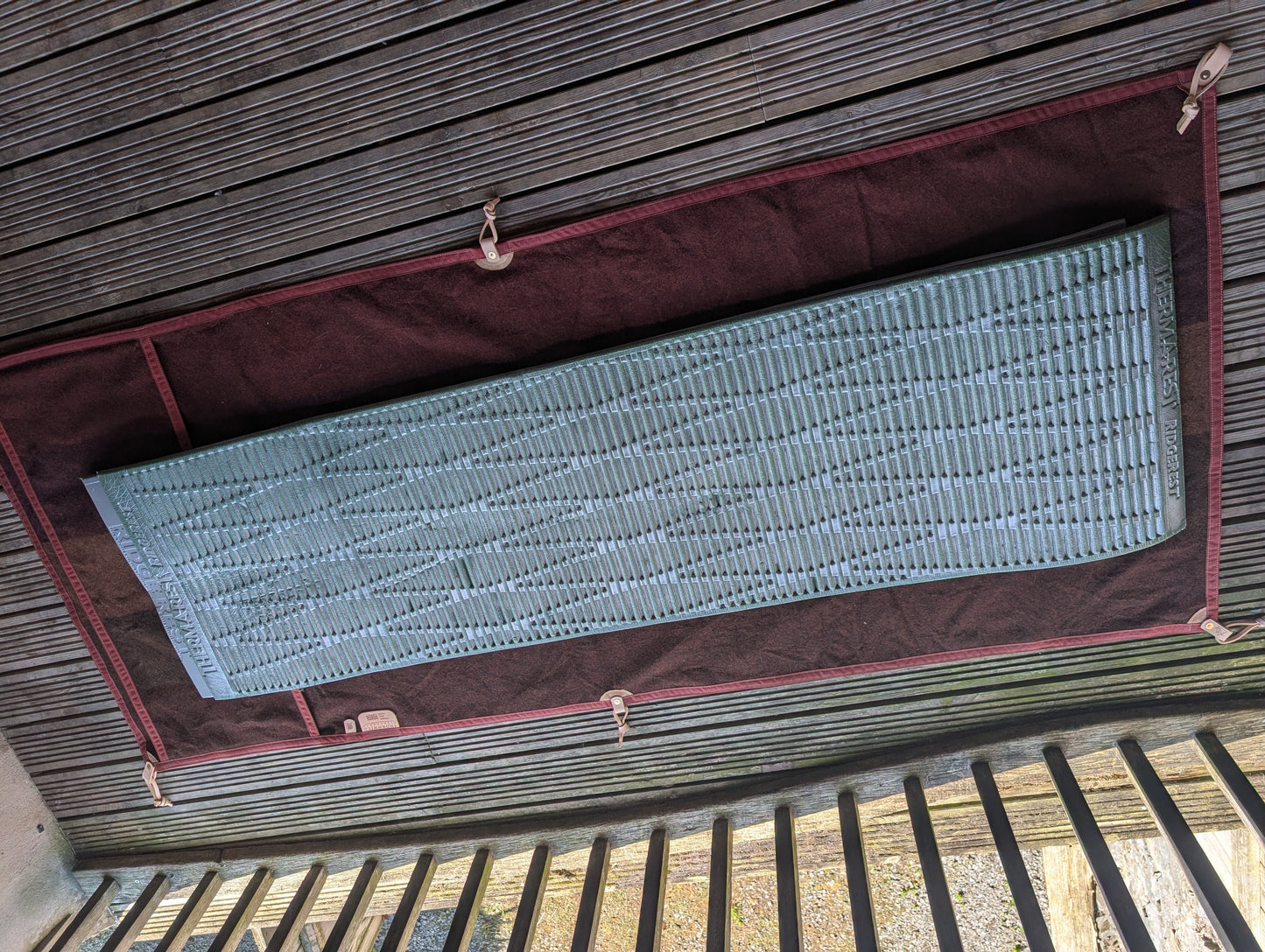 Sleeping mat/pad cover, waxed-canvas-backed wool with leather tie-outs