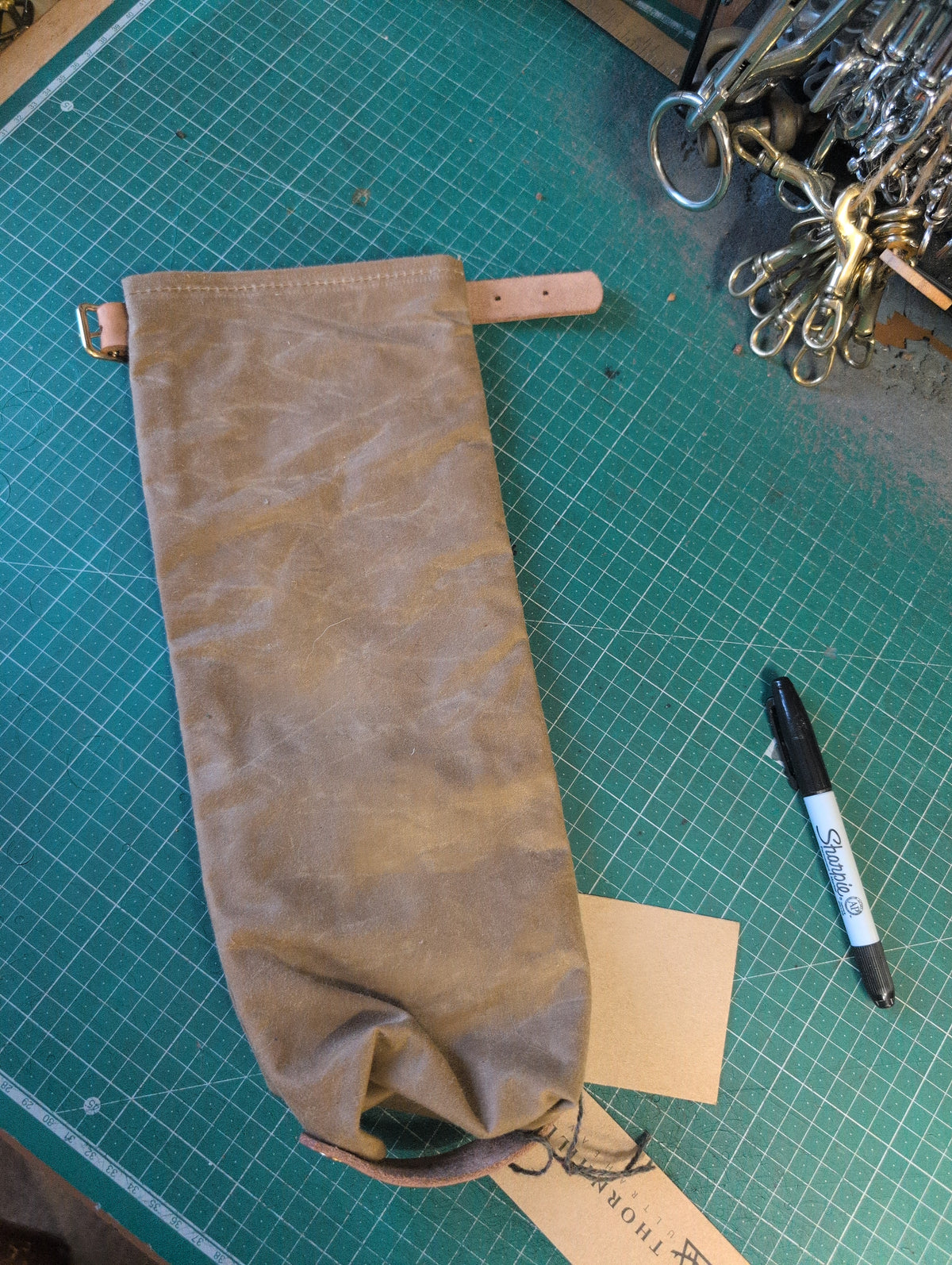 Tan buckled stuff sack