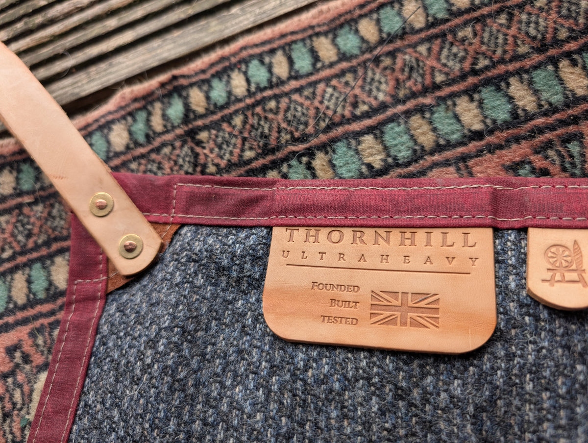 Wool lined, ground cloth/sit pad/ schleper waxed canvas-backed with leather tie-outs