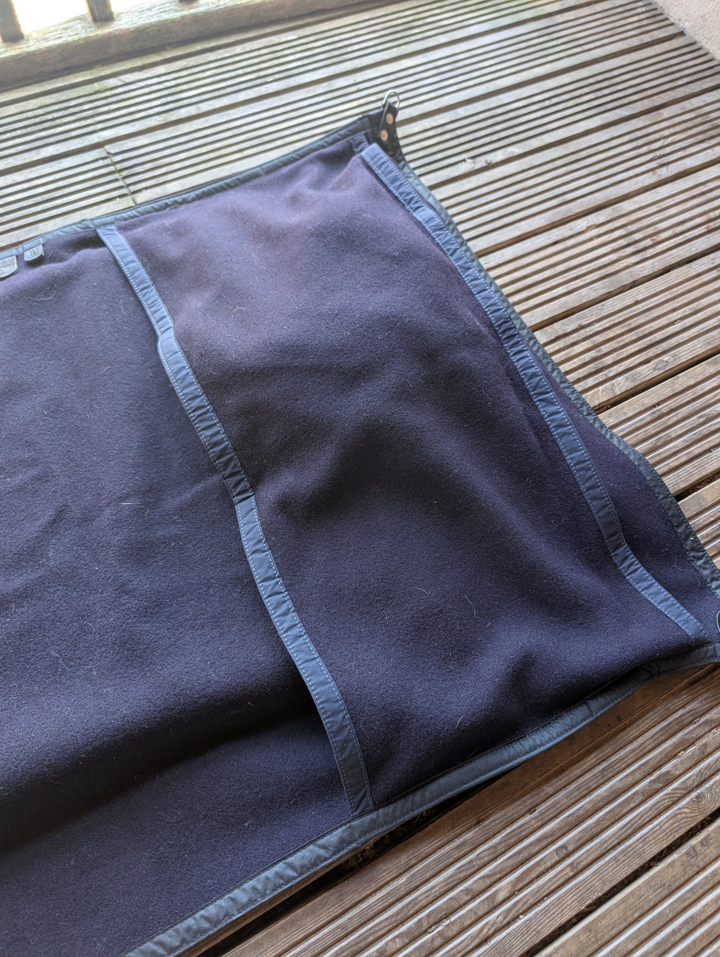 Sleeping mat cover, waxed-canvas-backed wool with leather tie-outs